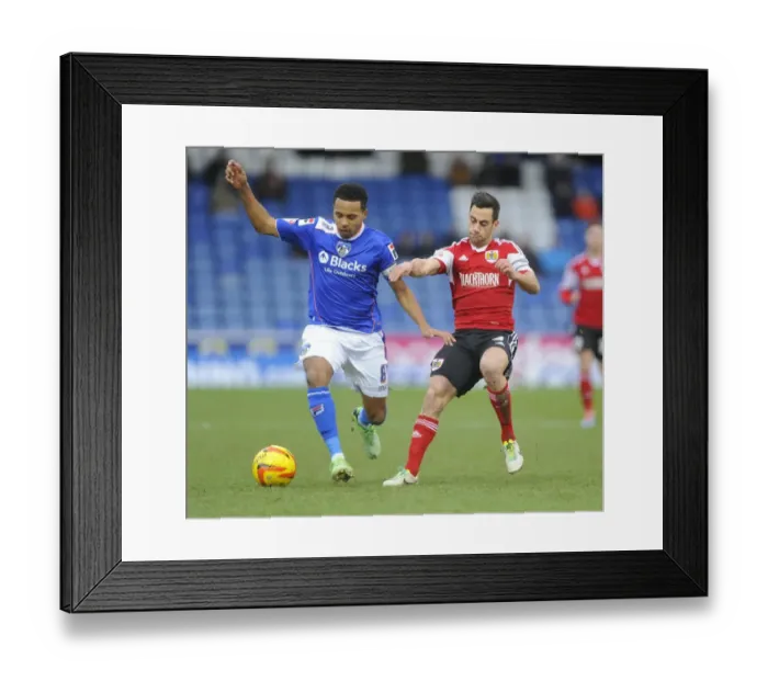 Framed Print : Bristol City's Sam Baldock vs Korey Smith of Oldham Athletic - Football Rivalry in Sky Bet League One Framed Print : Bristol City's Sam Baldock vs Korey Smith of Oldham Athletic - Football Rivalry in Sky Bet League One