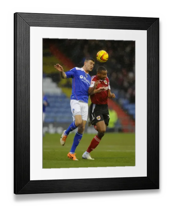 Framed Print : Tight Race: Wilson's Header Decides Oldham-Bristol City Clash Framed Print : Tight Race: Wilson's Header Decides Oldham-Bristol City Clash