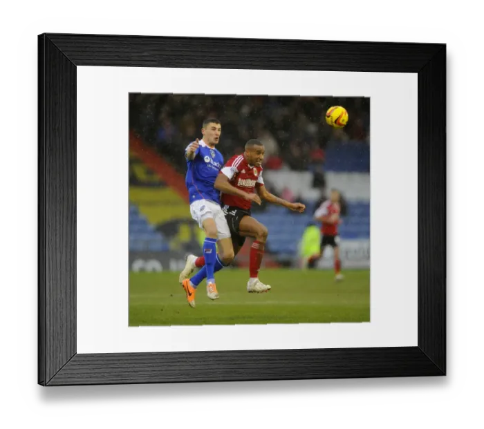 Framed Print : Tense Moment: Wilson's Header for Oldham Against Bristol City, February 2014 Framed Print : Tense Moment: Wilson's Header for Oldham Against Bristol City, February 2014