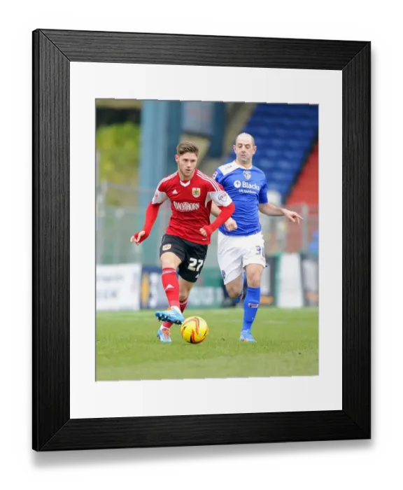 Framed Print : Wes Burns in Action: Oldham Athletic vs. Bristol City (February 2014) Framed Print : Wes Burns in Action: Oldham Athletic vs. Bristol City (February 2014)