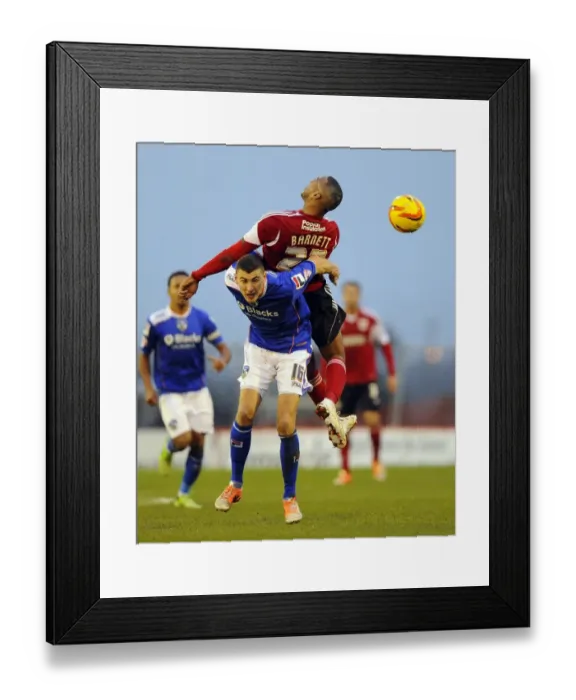 Framed Print : Bristol City's Tyrone Barnett Fights for Ball Against Oldham Athletic's James Wilson in Sky Bet League One Clash Framed Print : Bristol City's Tyrone Barnett Fights for Ball Against Oldham Athletic's James Wilson in Sky Bet League One Clash