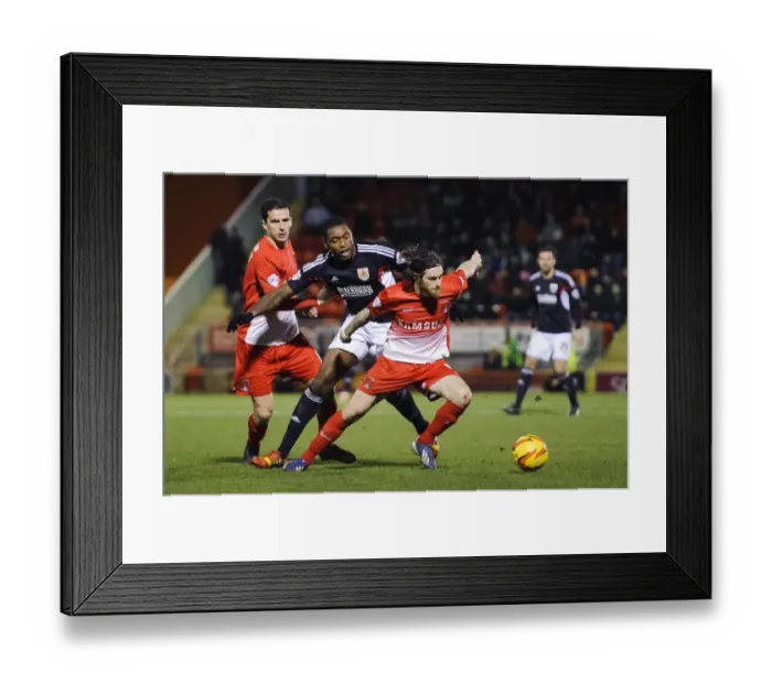 Framed Print : Intense Midfield Battle: Jay Emmanuel-Thomas vs. Romain Vincelot in Leyton Orient vs. Bristol City Football Rivalry Framed Print : Intense Midfield Battle: Jay Emmanuel-Thomas vs. Romain Vincelot in Leyton Orient vs. Bristol City Football Rivalry