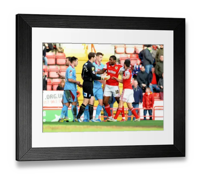 Framed Print : Bristol City's Jay Emmanuel-Thomas Intervenes in Heated Moment at Ashton Gate