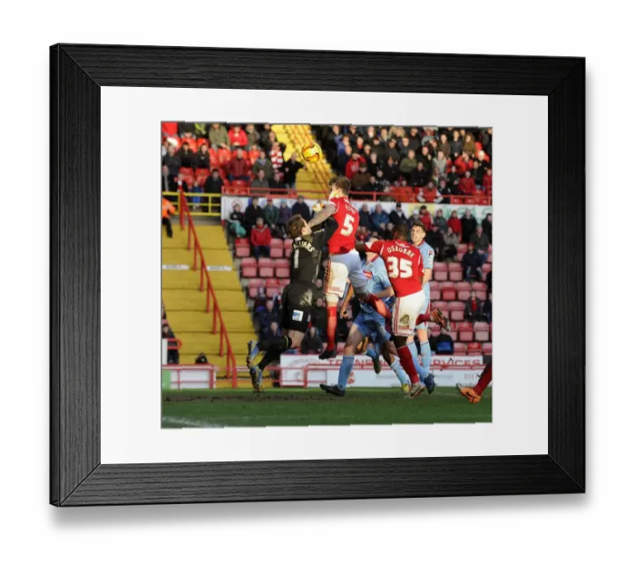 Framed Print : Aden Flint Heads the Ball for Bristol City Against Tranmere Rovers, Sky Bet League One, 2014