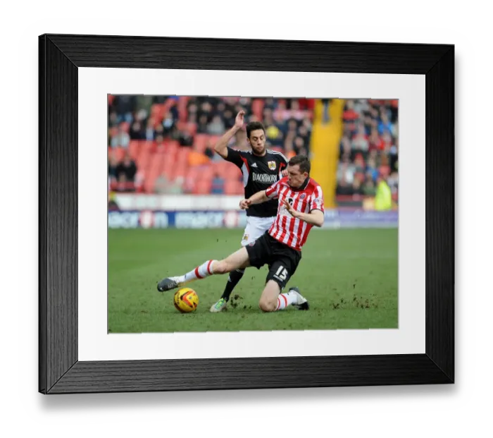 Framed Print : Bristol City's Sam Baldock vs. Sheffield United's Neil Collins - Intense Battle in Sky Bet League One (February 2014)