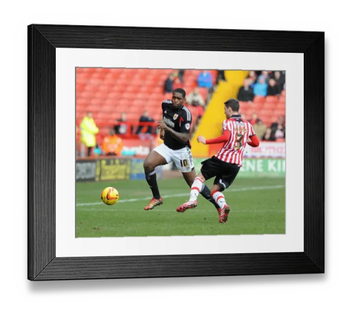 Framed Print : Jay Emmanuel-Thomas vs Bob Howard: Intense Moment in Sheffield United vs Bristol City Football Match, February 2014