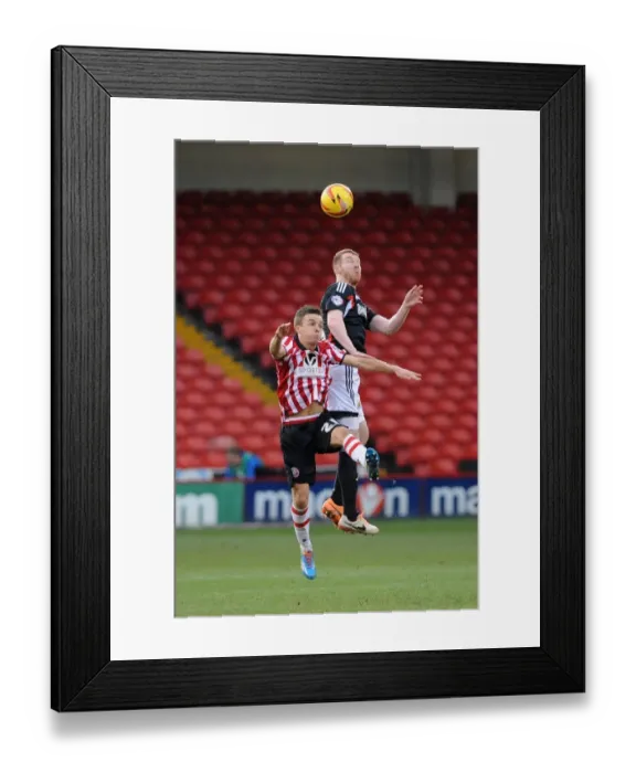Framed Print : Stephen Pearson vs Stefan Scougall: Intense Battle for the Ball in Sheffield United vs Bristol City Football Match, February 2014 Framed Print : Stephen Pearson vs Stefan Scougall: Intense Battle for the Ball in Sheffield United vs Bristol City Football Match, February 2014