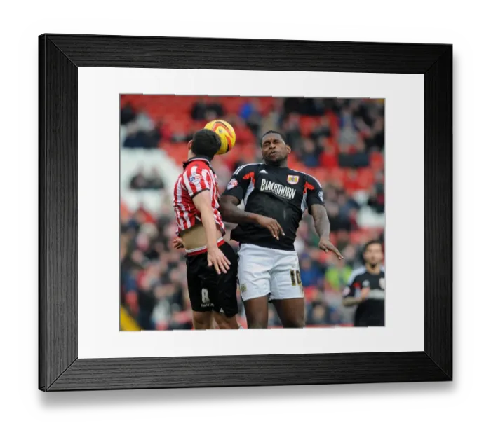 Framed Print : Jay Emmanuel-Thomas vs Michael Doyle: Intense Header Battle at Bramall Lane - Sheffield United vs Bristol City, Sky Bet League One