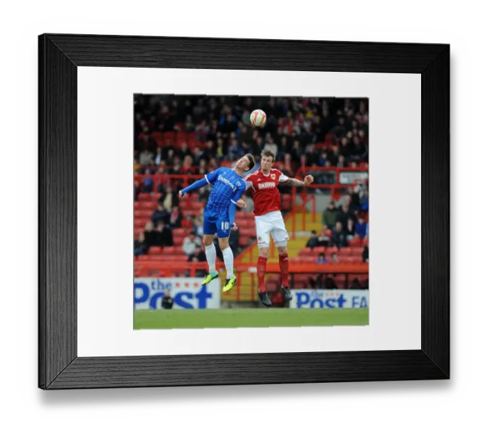 Framed Print : Intense Rivalry: Aden Flint vs. Cody McDonald - Bristol City vs. Gillingham, Sky Bet League One, 2014