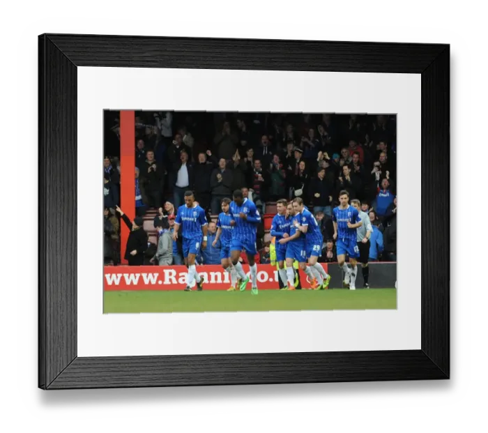 Framed Print : Charlie Lee's Goal Celebration: Gillingham's Upset Win Against Bristol City (01 / 03 / 2014)