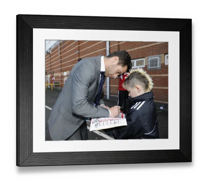 Framed Print : Bristol City's Sam Baldock Signs Young Fan's Programme During Bristol City vs Gillingham Match, Sky Bet League One, Ashton Gate