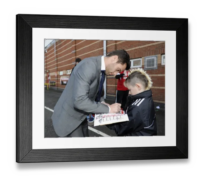 Framed Print : Bristol City's Sam Baldock Brings Smiles to a Young Fan with Autographed Programme Framed Print : Bristol City's Sam Baldock Brings Smiles to a Young Fan with Autographed Programme
