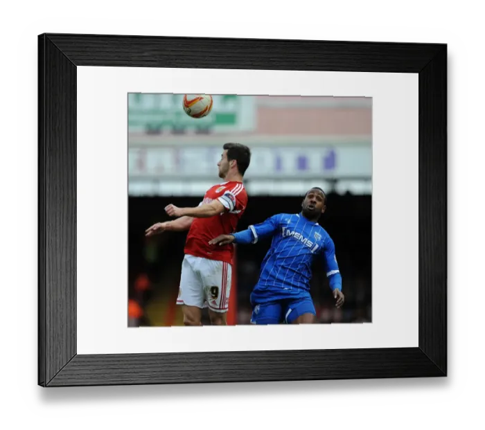 Framed Print : Bristol City's Sam Baldock Wins a Header in Sky Bet League One Clash Against Gillingham Framed Print : Bristol City's Sam Baldock Wins a Header in Sky Bet League One Clash Against Gillingham