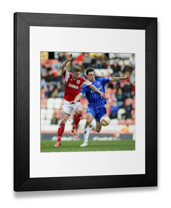 Framed Print : Bristol City vs Gillingham: Wade Elliott and Adam Birchall Battle for Possession Framed Print : Bristol City vs Gillingham: Wade Elliott and Adam Birchall Battle for Possession