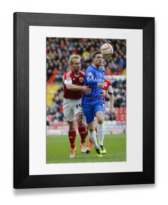Framed Print : Bristol City vs Gillingham: Intense Moment as Cody McDonald Clashes with Simon Gillett Framed Print : Bristol City vs Gillingham: Intense Moment as Cody McDonald Clashes with Simon Gillett