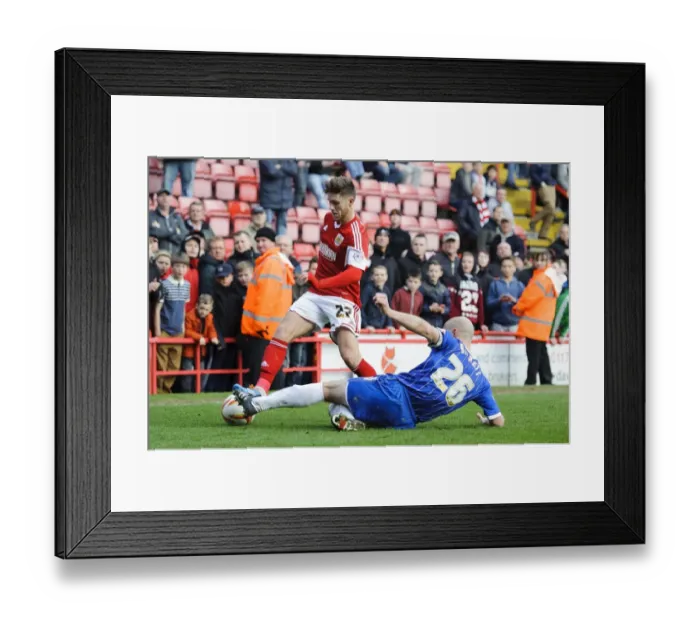Framed Print : Bristol City vs Gillingham: Wes Burns vs Adam Barrett - Intense Football Rivalry Framed Print : Bristol City vs Gillingham: Wes Burns vs Adam Barrett - Intense Football Rivalry