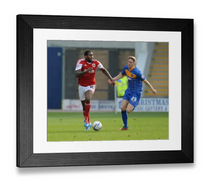 Framed Print : Chasing the Win: Intense Moment as Asa Hall of Shrewsbury Town Pursues Jay Emmanuel-Thomas of Bristol City Framed Print : Chasing the Win: Intense Moment as Asa Hall of Shrewsbury Town Pursues Jay Emmanuel-Thomas of Bristol City