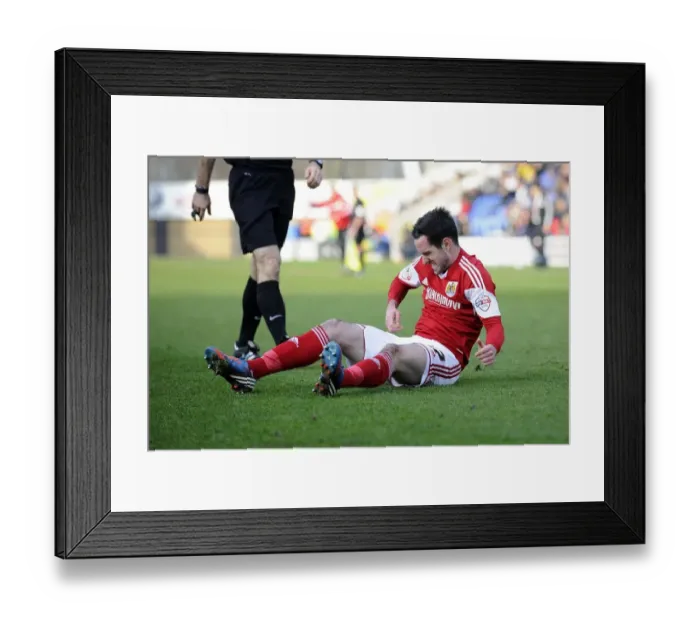 Framed Print : Bristol City's Greg Cunningham Suffers Injury on the Field during Shrewsbury Town vs. Bristol City Match, March 8, 2014 Framed Print : Bristol City's Greg Cunningham Suffers Injury on the Field during Shrewsbury Town vs. Bristol City Match, March 8, 2014