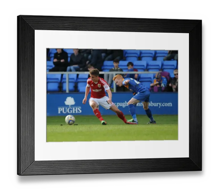 Framed Print : Bristol City's Joe Bryan Outmaneuvers Shrewsbury Town's Ryan Woods during Sky Bet League One Match Framed Print : Bristol City's Joe Bryan Outmaneuvers Shrewsbury Town's Ryan Woods during Sky Bet League One Match