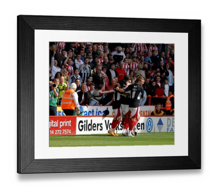Framed Print : Thrilling Team Celebration: Sheffield United vs. Bristol City