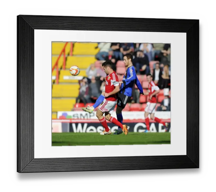 Framed Print : Clash at Ashton Gate: Bristol City vs Swindon Town - 15 March 2014 Framed Print : Clash at Ashton Gate: Bristol City vs Swindon Town - 15 March 2014