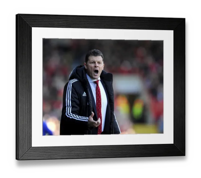 Framed Print : Steve Cotterill: Leading the Charge for Bristol City Against Swindon Town in Sky Bet League One, March 2014