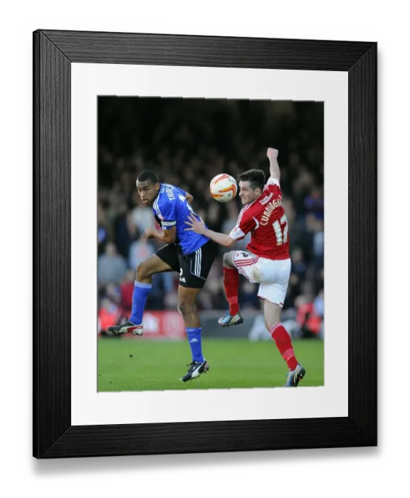 Framed Print : Bristol City vs Swindon Town: Intense Aerial Battle Between Greg Cunningham and Nathan Thompson Framed Print : Bristol City vs Swindon Town: Intense Aerial Battle Between Greg Cunningham and Nathan Thompson