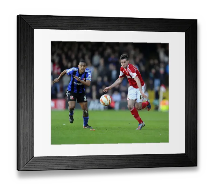 Framed Print : Battling for Supremacy: Cunningham vs Thompson in the Sky Bet League One Clash at Ashton Gate