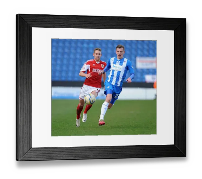 Framed Print : Bristol City's Scott Wagstaff Chases Down Colchester United's Alex Gilbey in Sky Bet League One Clash Framed Print : Bristol City's Scott Wagstaff Chases Down Colchester United's Alex Gilbey in Sky Bet League One Clash