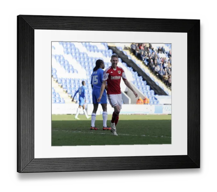 Framed Print : Scott Wagstaff's Euphoric Goal Celebration: A Standout Moment in Colchester United vs. Bristol City (2014)