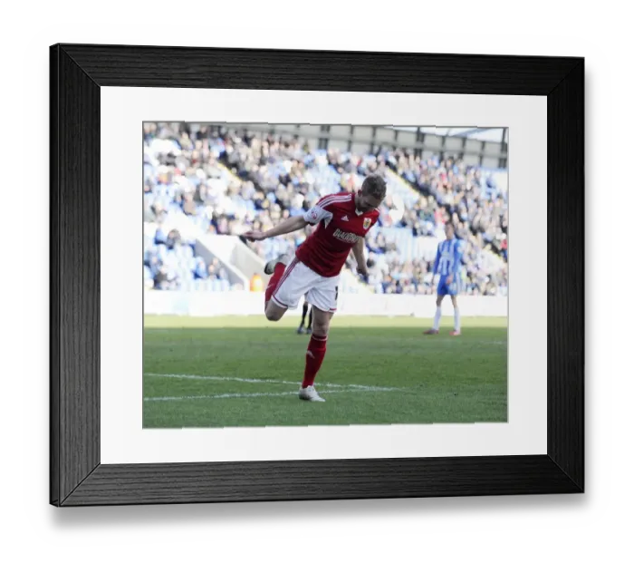 Framed Print : Scott Wagstaff's Euphoric Goal: A Memorable Moment in Colchester United vs. Bristol City (2014)