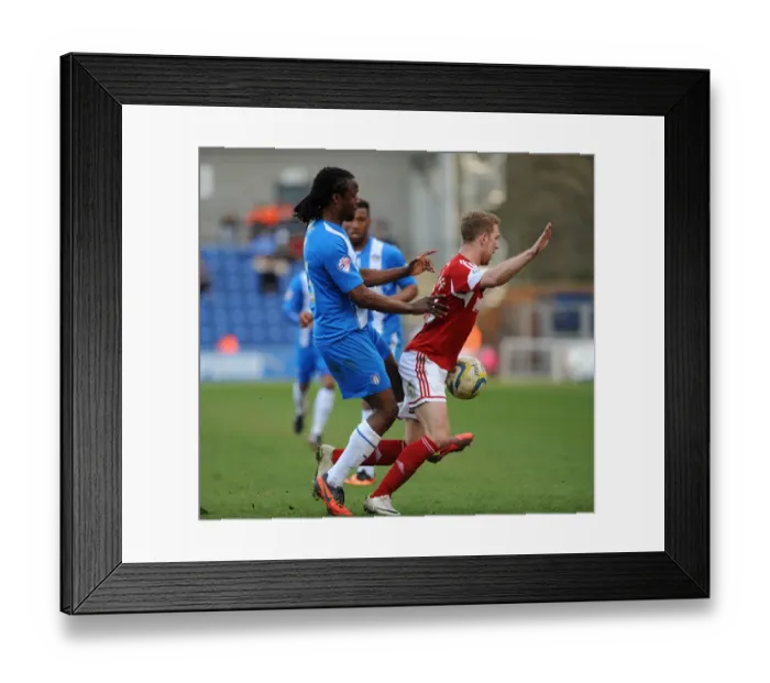Framed Print : Bristol City's Scott Wagstaff Fouled by Colchester United's Marcus Bean during Sky Bet League One Match Framed Print : Bristol City's Scott Wagstaff Fouled by Colchester United's Marcus Bean during Sky Bet League One Match
