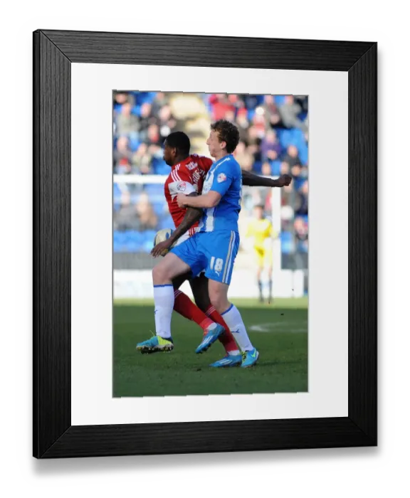Framed Print : Bristol City's Jay Emmanuel-Thomas Fends Off Tom Eastman of Colchester United Framed Print : Bristol City's Jay Emmanuel-Thomas Fends Off Tom Eastman of Colchester United