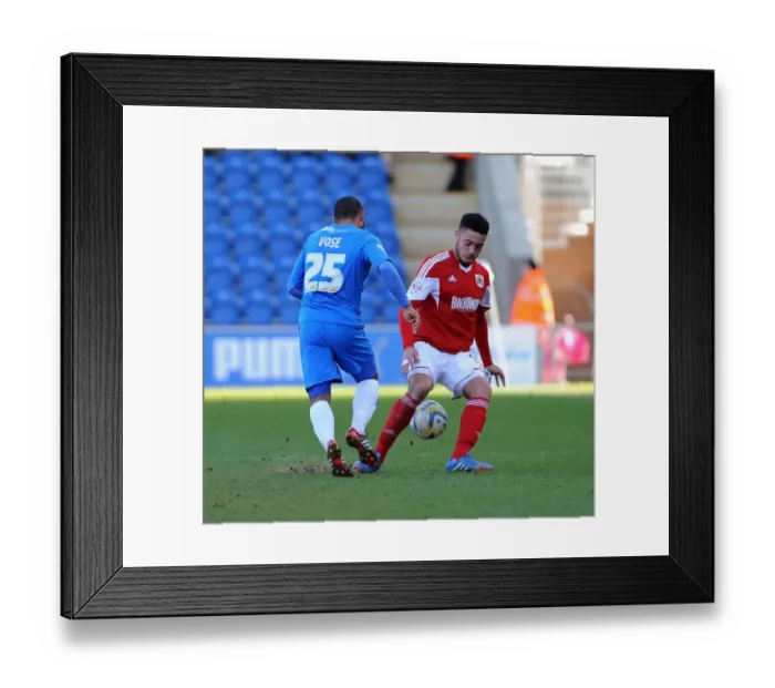 Framed Print : Bristol City's Derrick Williams Tackles Colchester United's Dominic Vose in Sky Bet League One Clash
