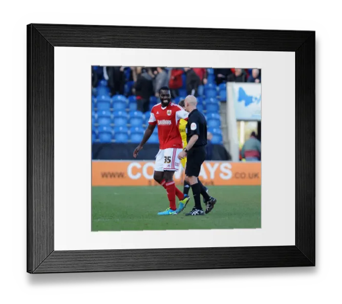 Framed Print : Bristol City's Karleigh Osborne Shares a Light-Hearted Moment with the Referee during Colchester United vs. Bristol City (22 / 03 / 2014)