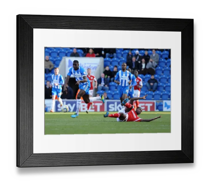 Framed Print : Bristol City's Jay Emmanuel-Thomas Contests the Ball with Colchester United's Magnus Okuonghae - Football Rivalry in League One Framed Print : Bristol City's Jay Emmanuel-Thomas Contests the Ball with Colchester United's Magnus Okuonghae - Football Rivalry in League One