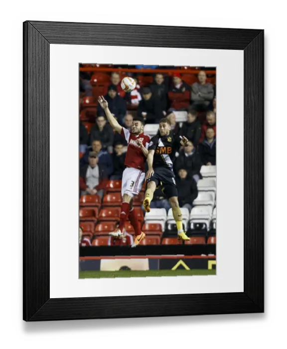 Framed Print : Bristol City vs Port Vale: Intense Aerial Battle Between Derrick Williams and Gavin Tomlin Framed Print : Bristol City vs Port Vale: Intense Aerial Battle Between Derrick Williams and Gavin Tomlin