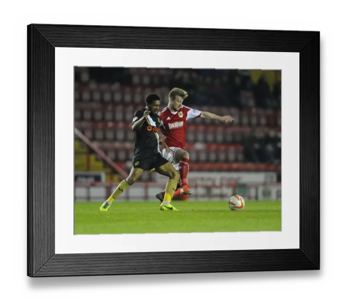 Framed Print : Bristol City vs Swindon Town: Wade Elliott Fights for Ball in Intense Football Match