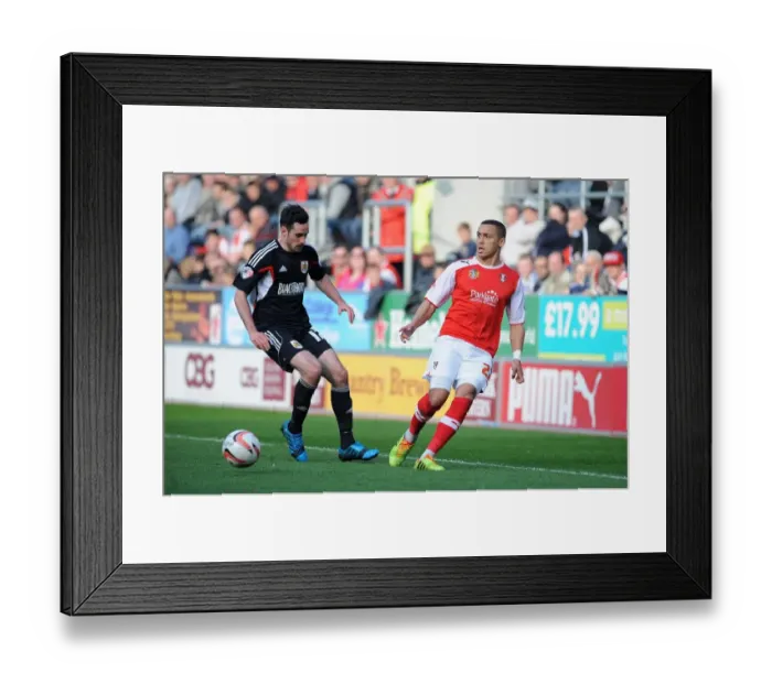 Framed Print : Rotherham United's Tavernier Evades Pressure from Cunningham in Sky Bet League One Clash Framed Print : Rotherham United's Tavernier Evades Pressure from Cunningham in Sky Bet League One Clash