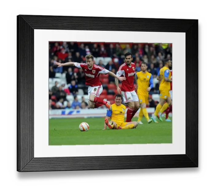 Framed Print : Intense Rivalry: Wade Elliott vs Lee Holmes - A Battle for Supremacy in the Sky Bet League One Clash between Bristol City and Preston North End Framed Print : Intense Rivalry: Wade Elliott vs Lee Holmes - A Battle for Supremacy in the Sky Bet League One Clash between Bristol City and Preston North End
