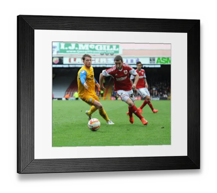 Framed Print : Battling for Supremacy: Martin Paterson vs. Joe Garner in the Intense Clash between Bristol City and Preston North End