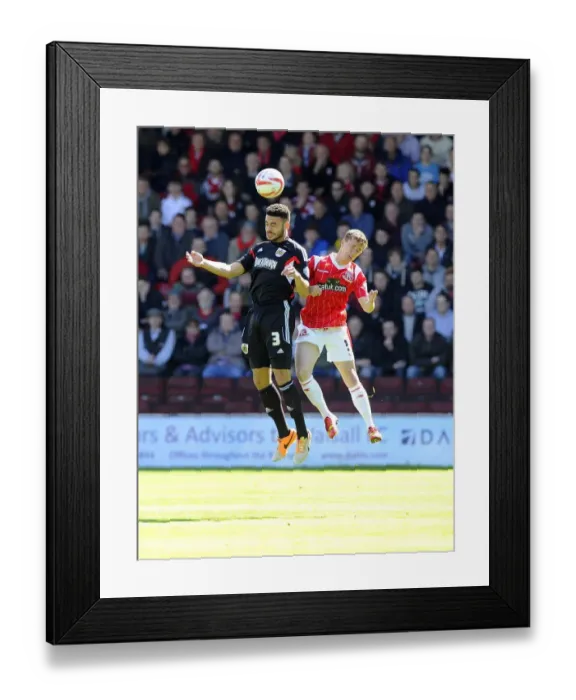 Framed Print : Bristol City's Derrick Williams vs Walsall's James Baxendale - Football Rivalry in the Sky Bet League One