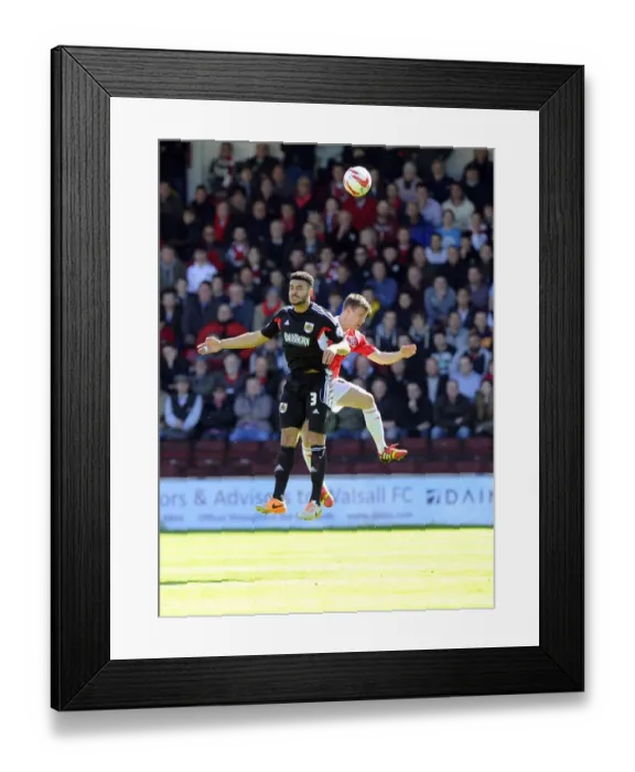 Framed Print : Bristol City's Derrick Williams Fights for Ball Against Walsall's James Baxendale in Sky Bet League One Clash
