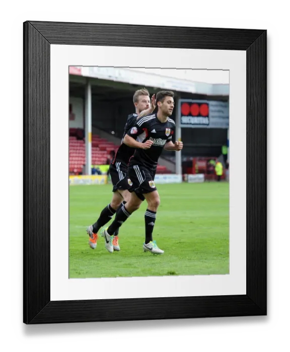 Framed Print : Battling for Victory: Sam Baldock and Wade Elliott Celebrate for Bristol City in Walsall Match, April 2014
