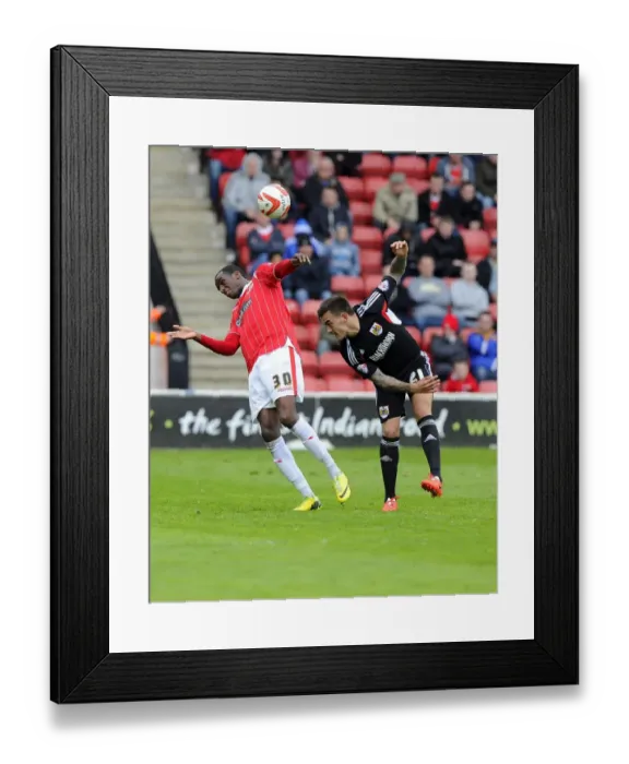 Framed Print : Maron Pack vs Michael Ngoo: Aerial Battle in Walsall vs Bristol City Football Match, League One, 2014 Framed Print : Maron Pack vs Michael Ngoo: Aerial Battle in Walsall vs Bristol City Football Match, League One, 2014