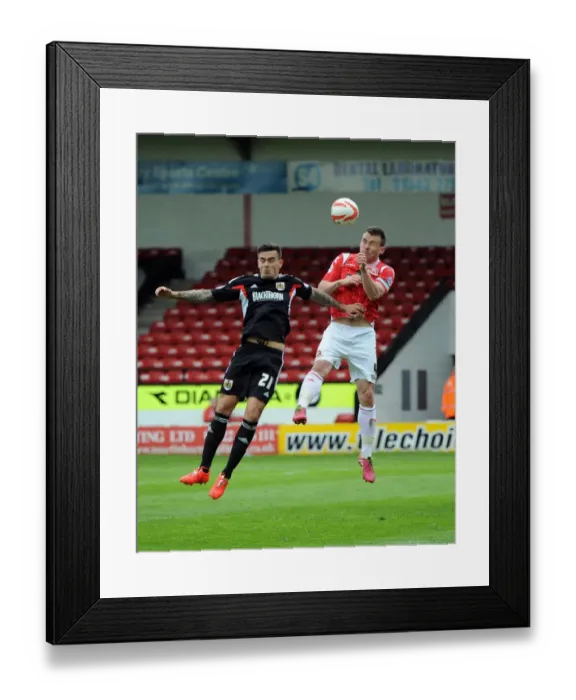 Framed Print : Maron Pack vs. Andrew Butler: Intense Aerial Battle in Walsall vs. Bristol City Football Match, Sky Bet League One Framed Print : Maron Pack vs. Andrew Butler: Intense Aerial Battle in Walsall vs. Bristol City Football Match, Sky Bet League One