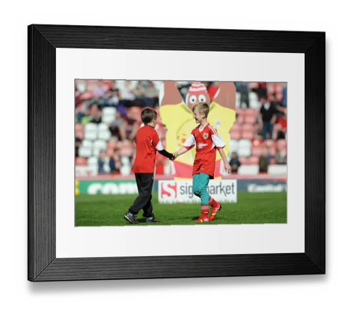 Framed Print : Camaraderie on the Field: Young Rivals Leo Worlock and Luca Fortuna Celebrate Bristol City's Win Against Notts County Framed Print : Camaraderie on the Field: Young Rivals Leo Worlock and Luca Fortuna Celebrate Bristol City's Win Against Notts County