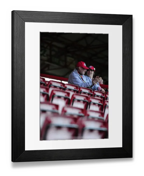 Framed Print : Two Fans Watch Intently from the East End during Bristol City vs Notts County Football Match, 2014 Framed Print : Two Fans Watch Intently from the East End during Bristol City vs Notts County Football Match, 2014