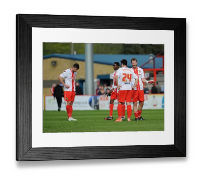 Framed Print : Dejected Stevenage Players Face Relegation After 1-3 Defeat to Bristol City Framed Print : Dejected Stevenage Players Face Relegation After 1-3 Defeat to Bristol City