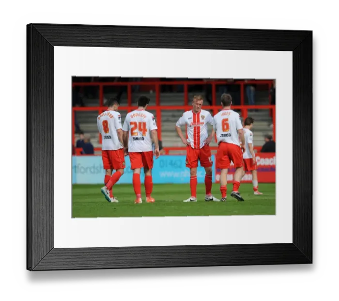 Framed Print : Dejected Stevenage Players After 1-3 Loss to Bristol City, Resulting in Their Relegation